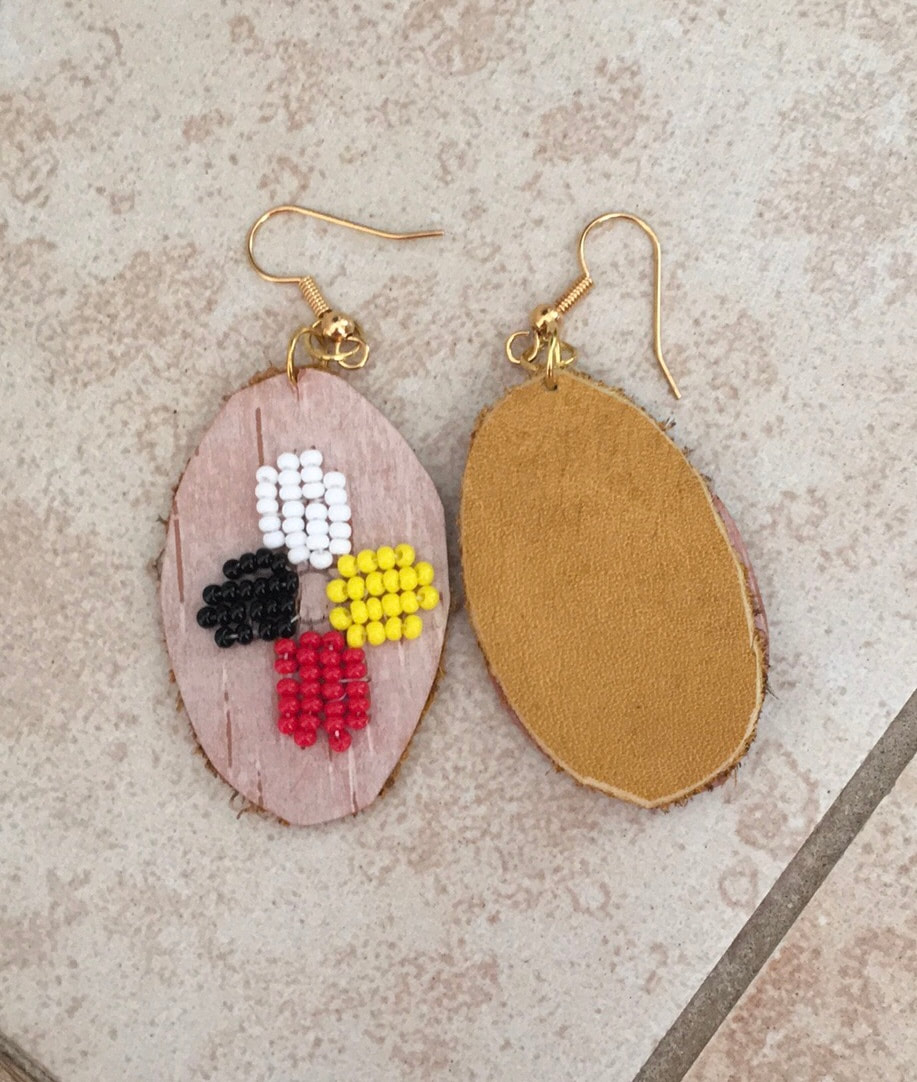 Birch bark earrings with leather backing by Althea Morriseau.