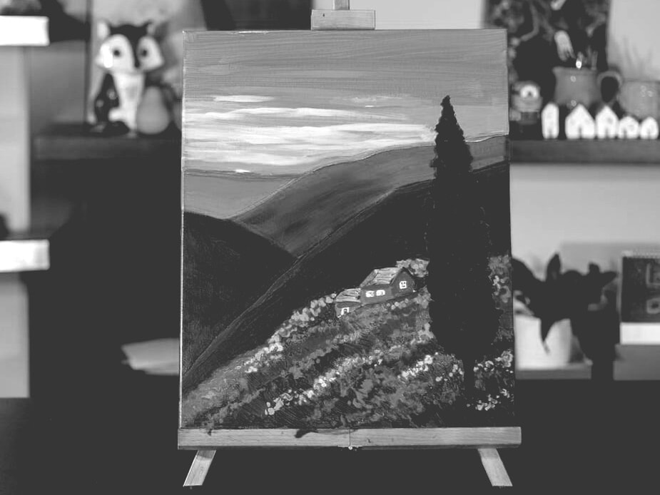Painting of a tree, hills, and sky.